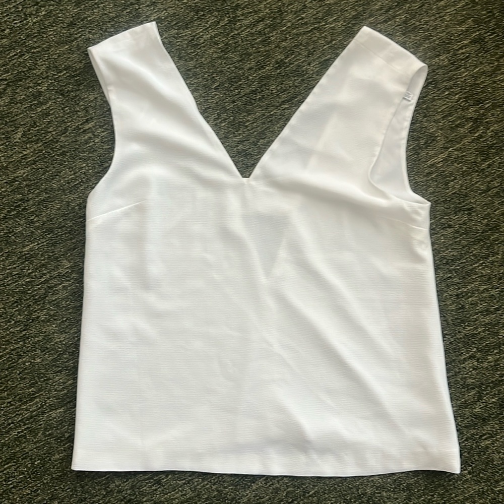 Finders Keepers white sleeveless blouse. NWOT